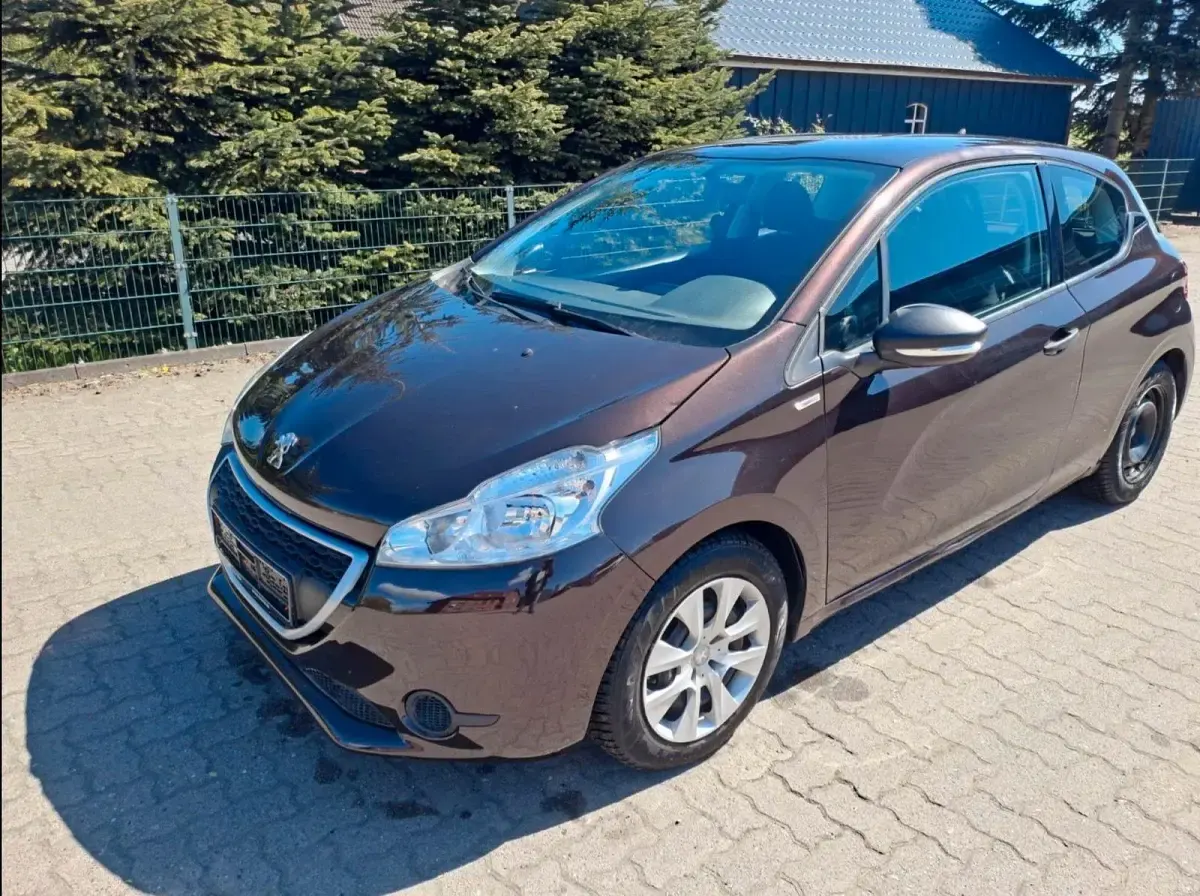 Gebraucht Peugeot 208 68 PS (50 kW) 2013 Braun Kleinwagen