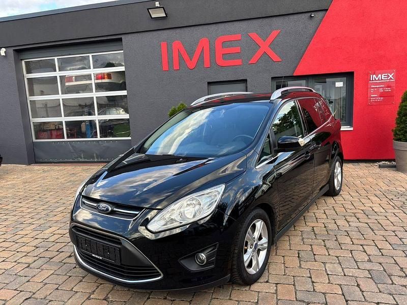 Grau Gebraucht 2012 Ford Grand C-Max Champions Edition Van / Kleinbus | 6.490 € (Etwas zu teuer) - Bild 1/4