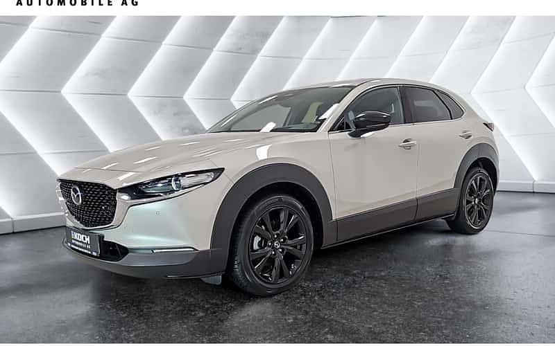 Grau Gebraucht 2024 Mazda CX-30 Homura-Line SUV | 25.400 € - Bild 1/4