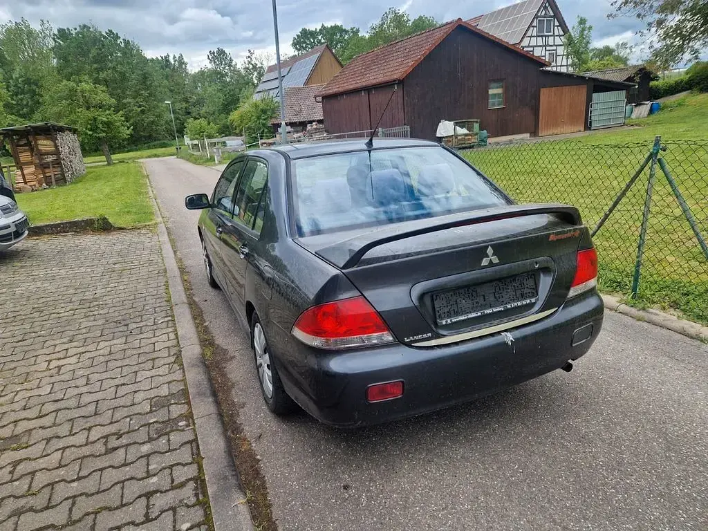 Gebraucht Mitsubishi Lancer 98 PS (72 kW) 2004 Grau Limousine