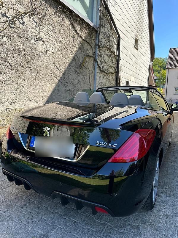 Schwarz Gebraucht 2010 Peugeot 308 CC Cabrio | 9.999 € - Bild 1/4