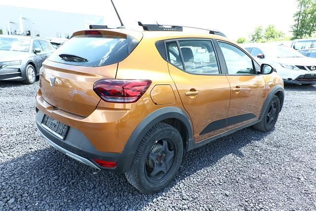 Atacamaorange atacamaorange Gebraucht 2021 Dacia Sandero Comfort Kleinwagen | 14.721 € (Fairer Preis) - Bild 1/4
