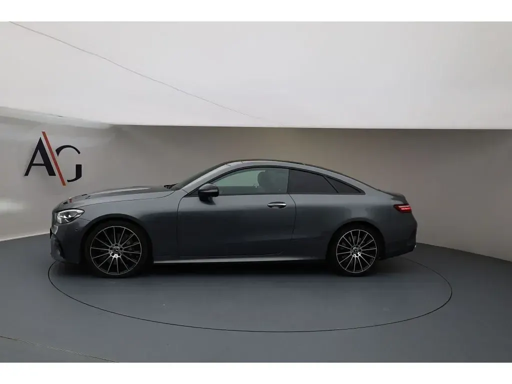 Gebraucht Mercedes E450 AMG 367 PS (269 kW) 2022 Selenitgrau metallic Coupé
