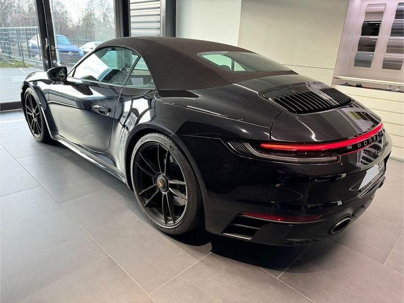 Schwarz Gebraucht 2022 Porsche 911 Carrera 4 Cabriolet Cabrio | 170.000 € (Teuer) - Bild 1/4