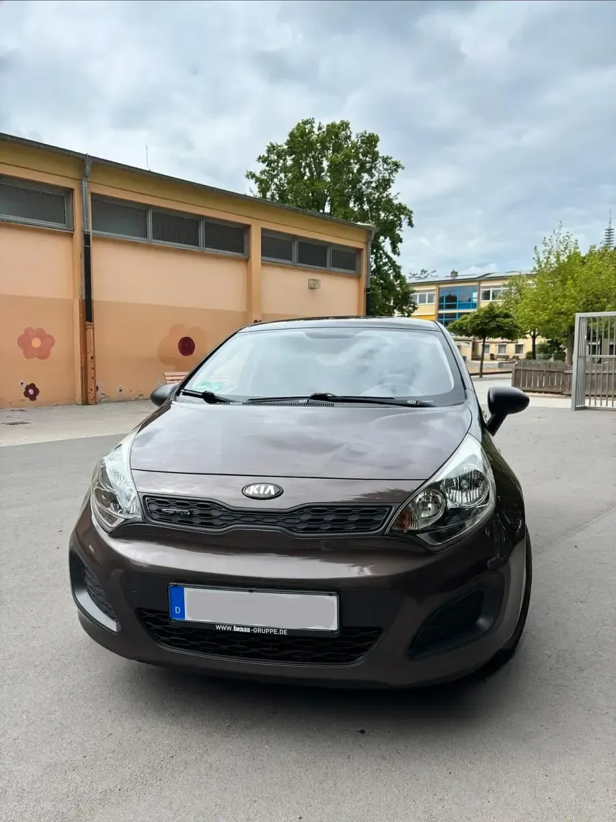 Gebraucht Kia Rio 84 PS (61 kW) 2012 Braun Kleinwagen