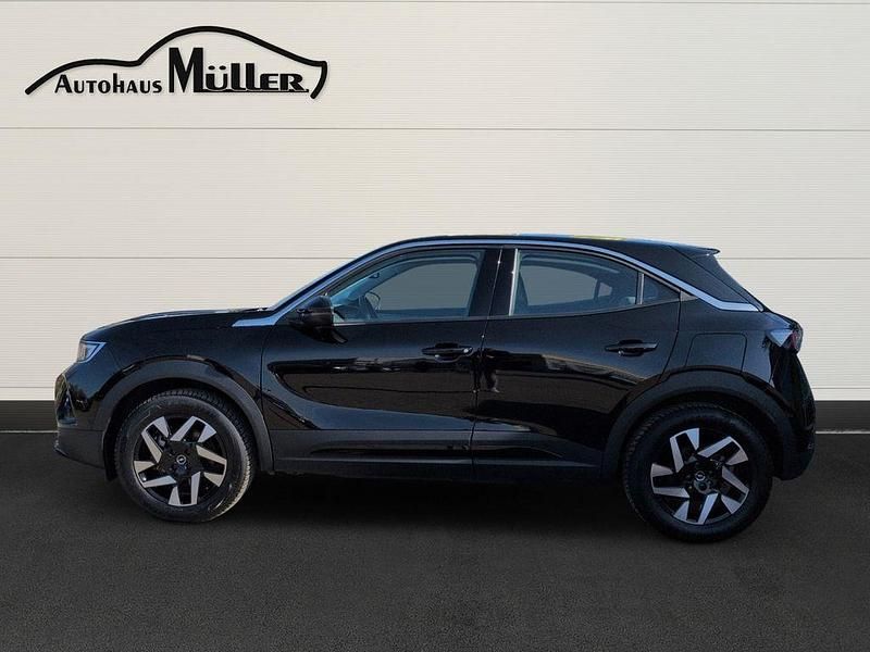 Gebraucht Opel Mokka-e Elegance 100 kW (136 PS) 2024 Lackierung schwarz perla nera/ SUV