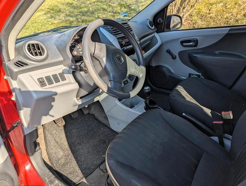 Gebraucht Nissan Pixo 68 PS (50 kW) 2010 Rot Kleinwagen