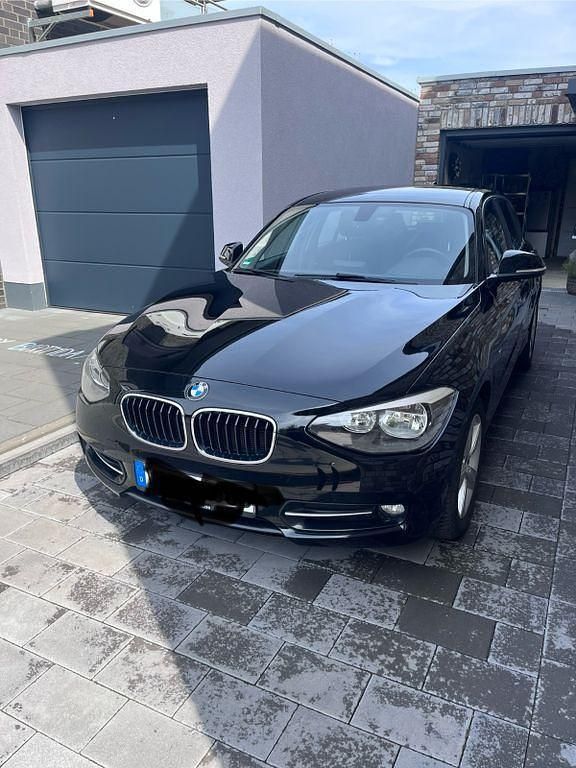 Schwarz Gebraucht 2014 BMW 116 Sport Line Kleinwagen | 11.900 € (Etwas zu teuer) - Bild 1/4