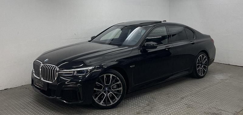Black sapphire Gebraucht 2022 BMW 745e M Sport Limousine | 49.400 € (Guter Preis) - Bild 1/4