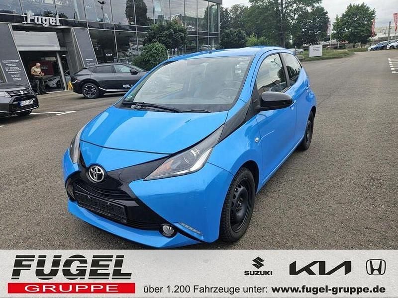 Cyan metallic Gebraucht 2015 Toyota Aygo X-cite Kleinwagen | 7.495 € (Fairer Preis) - Bild 1/4