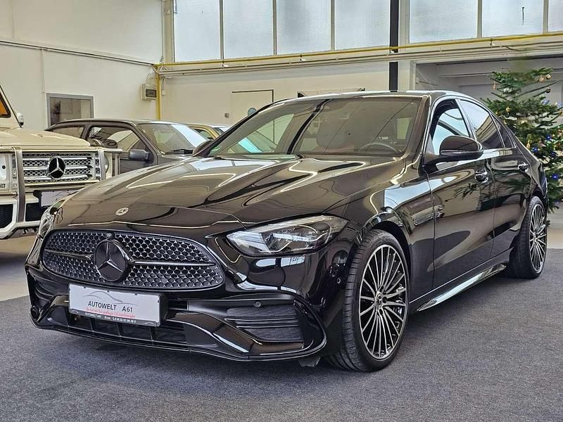 Ung. schwarz unilack Gebraucht 2022 Mercedes C180 AMG Limousine | 40.550 € (Teuer) - Bild 1/4