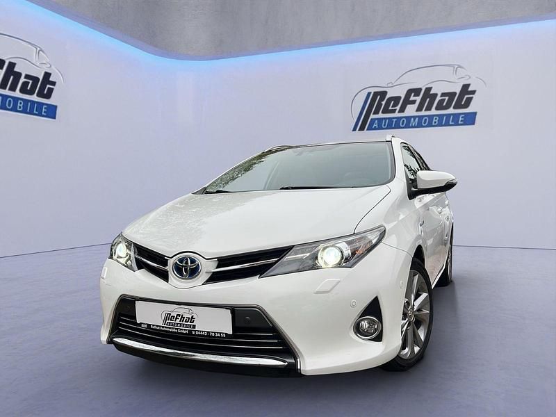Weiß Gebraucht 2014 Toyota Auris Hybrid Executive Kombi | 12.700 € (Fairer Preis) - Bild 1/4