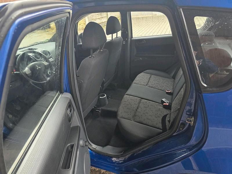 Second-hand Mitsubishi Colt 95 CP (69 kW) 2009 Albastru Hatchback