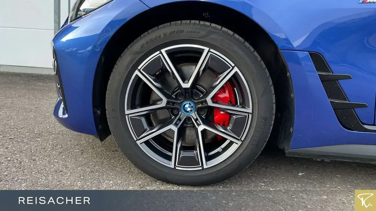 Gebraucht BMW i4 Performance 350 kW (476 PS) 2023 M portimao blau metallic Limousine