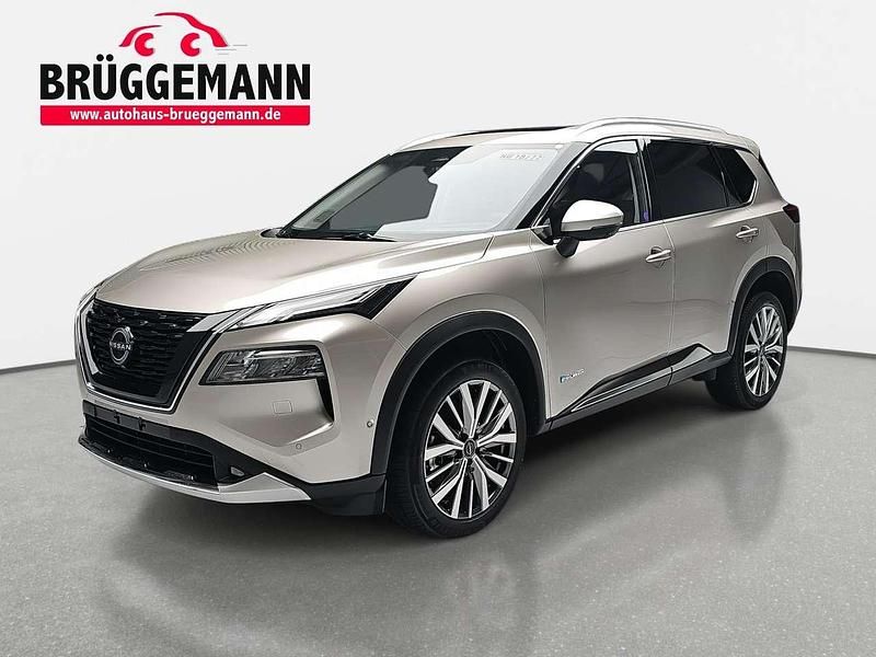 Champagne silver metallic Neu 2025 Nissan X-Trail Tekna SUV | 40.990 € - Bild 1/4