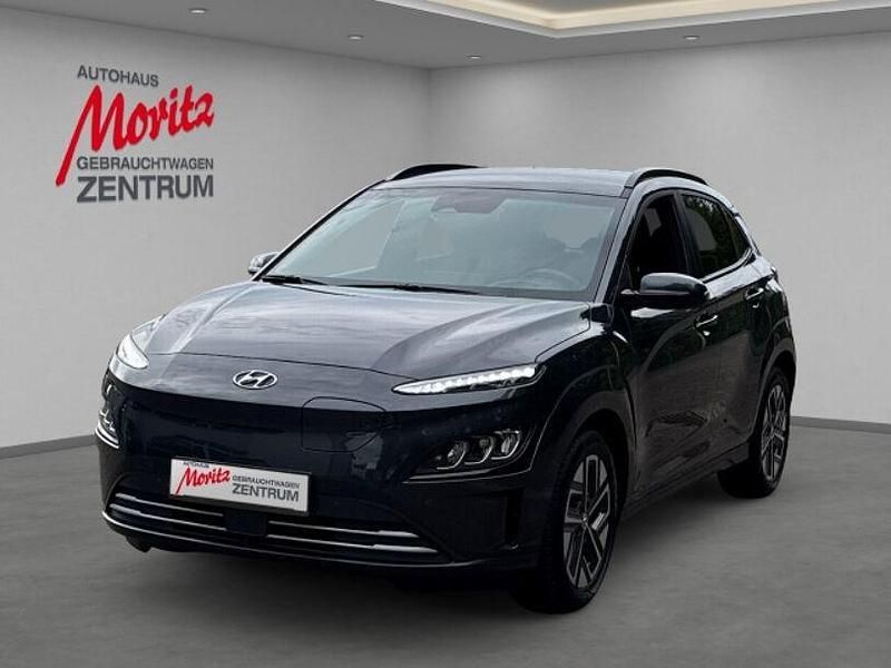 Dark knight / mic (metallic) Gebraucht 2024 Hyundai Kona Prime SUV | 31.870 € (Superpreis) - Bild 1/4