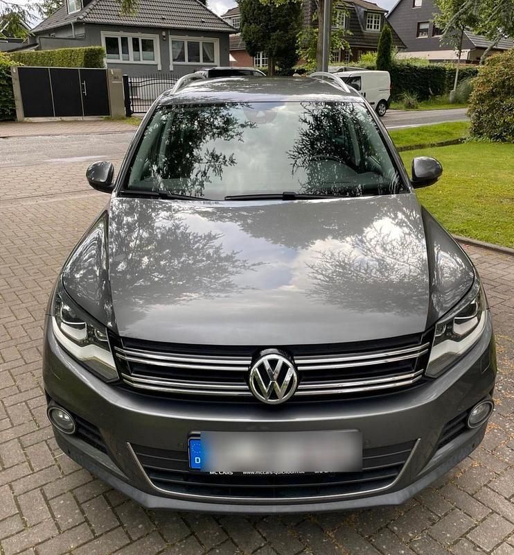 Grau Gebraucht 2014 VW Tiguan Cup SUV | 10.900 € (Fairer Preis) - Bild 1/4