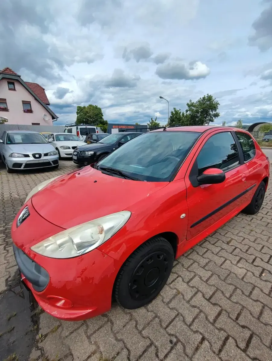 Gebraucht Peugeot 206+ 85 PS (62 kW) 2009 Rot Kleinwagen