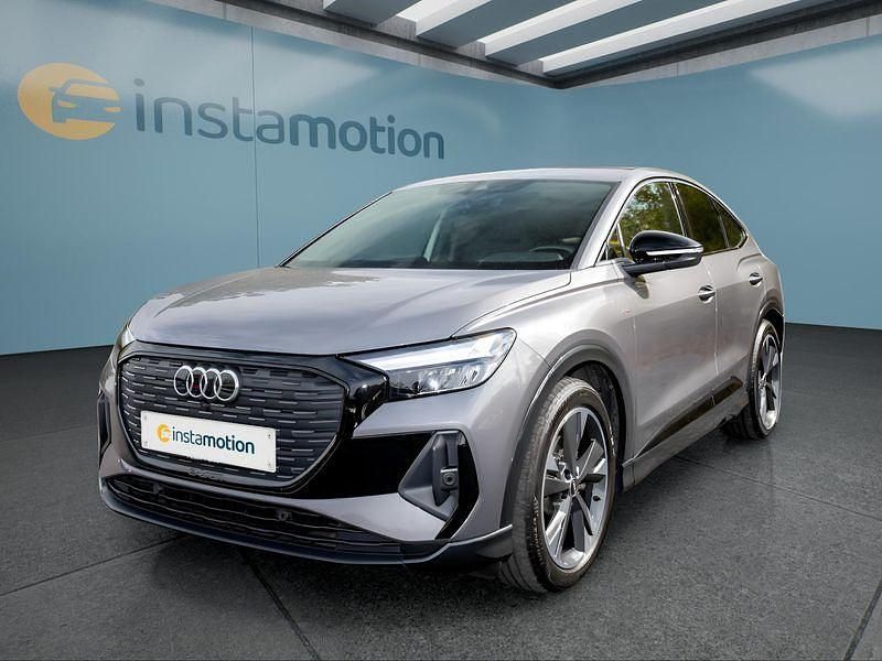 Grau Gebraucht 2022 Audi Q4 Sportback e-tron SUV | 26.990 € (Fairer Preis) - Bild 1/4