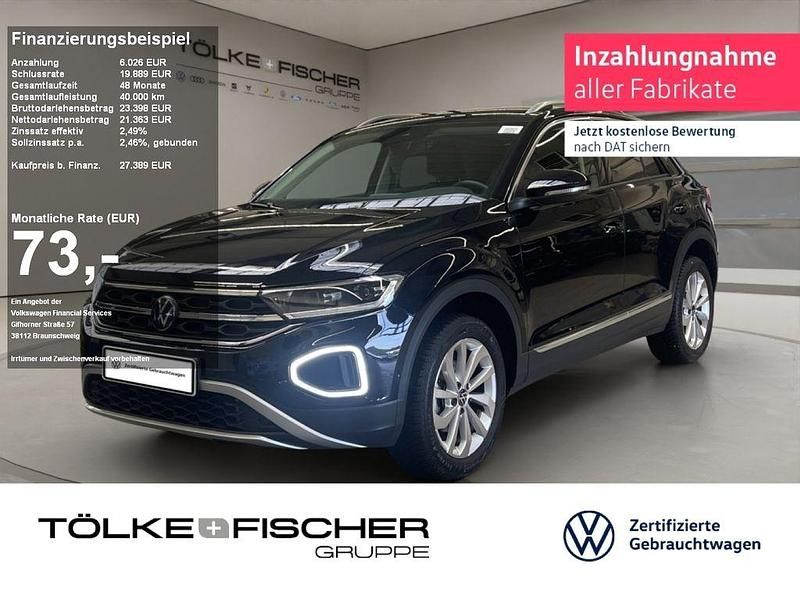 Deep black perleffekt (metallic) Gebraucht 2024 VW T-Roc Style SUV | 27.389 € (Guter Preis) - Bild 1/4