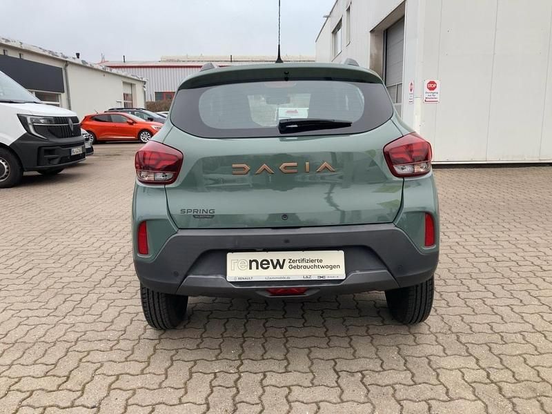 Gebraucht Dacia Spring Extreme 47 kW (65 PS) 2024 Olivgrau (metallic) Kleinwagen