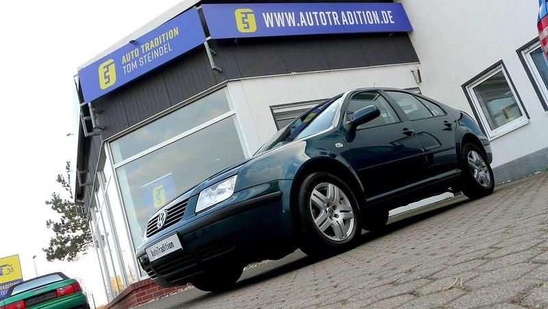 Gebraucht VW Bora Comfortline 105 PS (77 kW) 2004 Oceanicgrün perleffekt Limousine