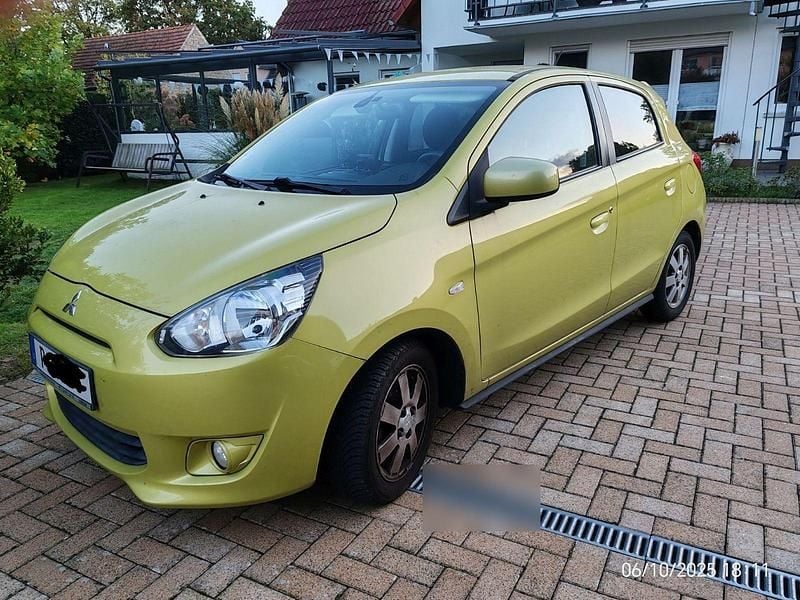 Gelb Gebraucht 2014 Mitsubishi Space Star Kleinwagen | 7.300 € (Fairer Preis) - Bild 1/4