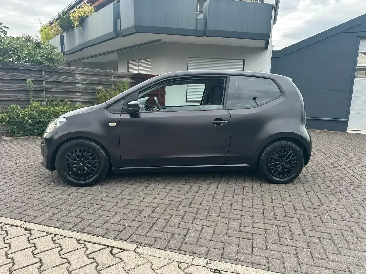 Używany VW up! 60 KM (44 kW) 2014 Czarny Hatchback