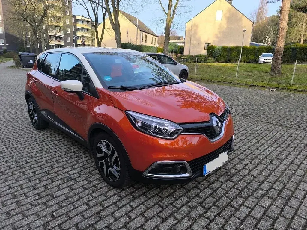 Używany Renault Captur Luxe 120 KM (88 kW) 2015 Pomarańczowy SUV