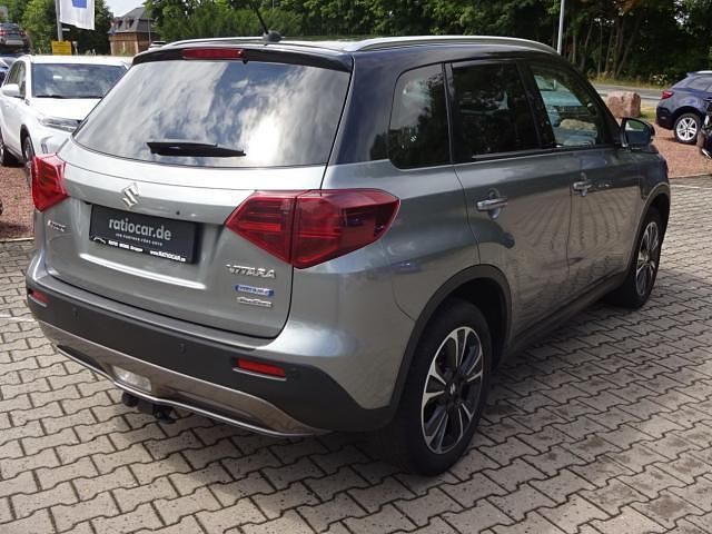 Galactic/cosmic black pearl metallic Gebraucht 2021 Suzuki Vitara Comfort+ SUV | 19.790 € - Bild 1/4