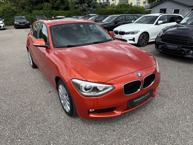 Valencia orange metallic Gebraucht 2012 BMW 116 Sport Line Kleinwagen | 7.600 € (Fairer Preis) - Bild 1/4