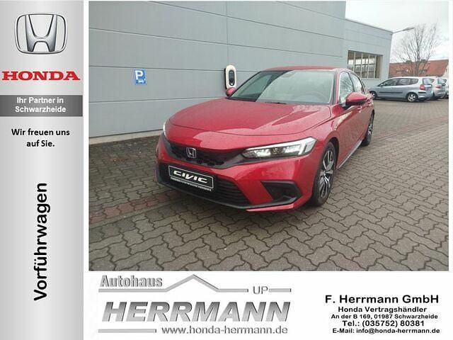 Premium crystal red metallic Neu 2025 Honda Civic Elegance Limousine | 36.990 € (Teuer) - Bild 1/2