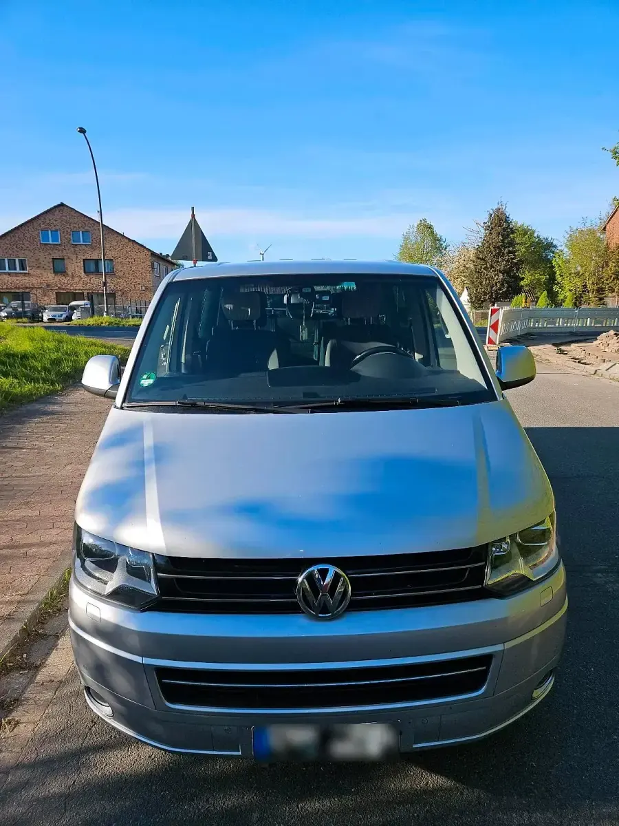 Używany VW Multivan Edition 180 KM (132 kW) 2013 Srebrny Minivan