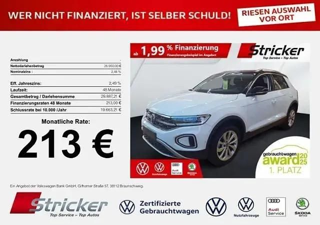 Weiß (pure white) Gebraucht 2024 VW T-Roc Style SUV | 26.946 € (Superpreis) - Bild 1/3