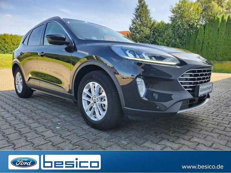 Obsidianschwarz metallic (schwarz) Gebraucht 2021 Ford Kuga Titanium SUV | 23.990 € (Fairer Preis) - Bild 1/4