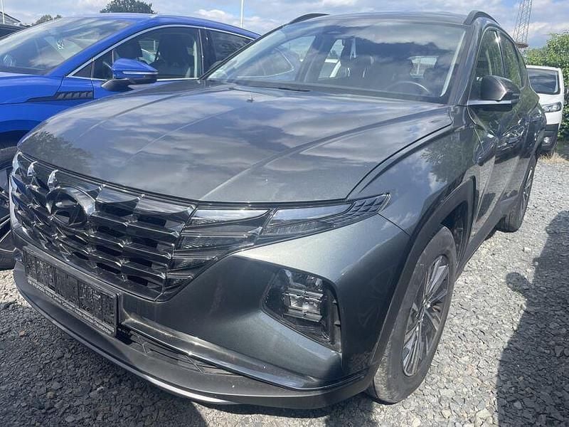 Grau Gebraucht 2021 Hyundai Tucson Select SUV | 24.800 € (Superpreis) - Bild 1/3