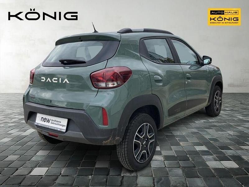 Gebraucht Dacia Spring Essentiel 33 kW (45 PS) 2023 Olivgrün Kleinwagen