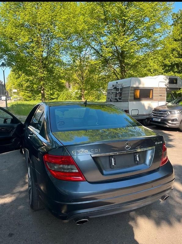 Grau Gebraucht 2008 Mercedes C320 AMG line Limousine | 6.500 € (Fairer Preis) - Bild 1/4