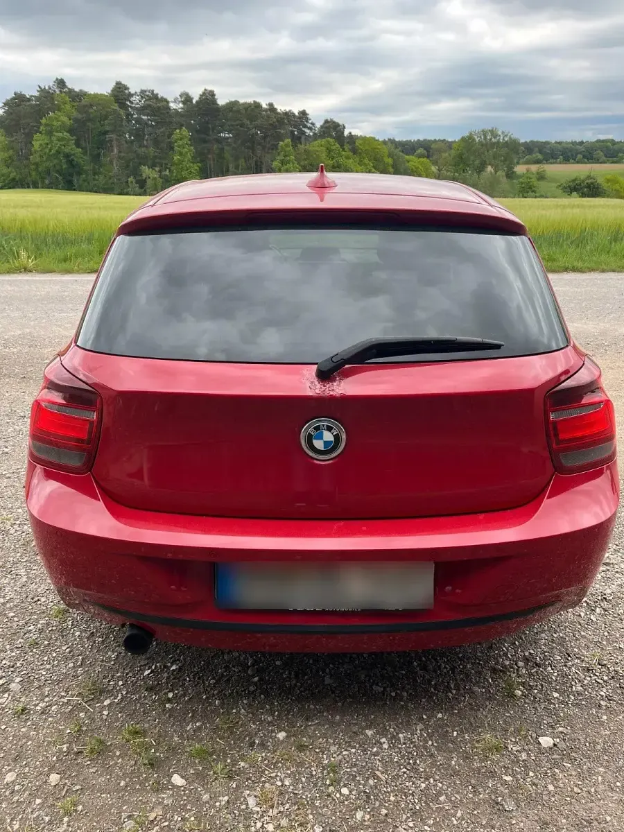 Gebraucht BMW 116 Sport Line 136 PS (100 kW) 2012 Rot Kleinwagen