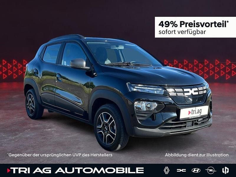 Magmaschwarz (metallic) Gebraucht 2023 Dacia Spring Essentiel Kleinwagen | 12.990 € (Fairer Preis) - Bild 1/4