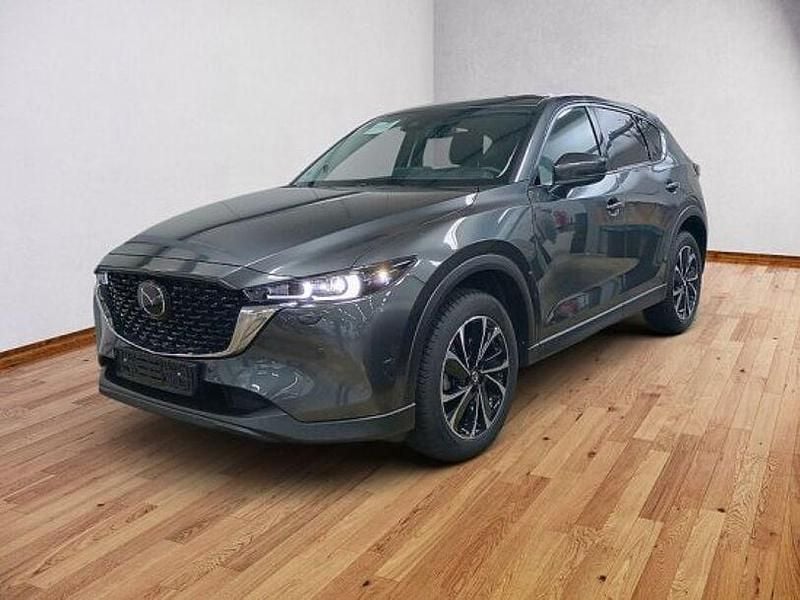 Machine grey (metallic) Gebraucht 2024 Mazda CX-5 Exclusive-Line SUV | 34.990 € (Fairer Preis) - Bild 1/4