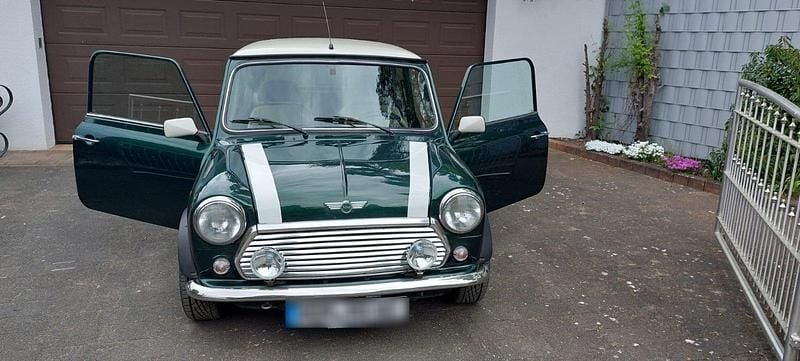 Second-hand Mini 1300 63 CP (46 kW) 1999 Verde Hatchback