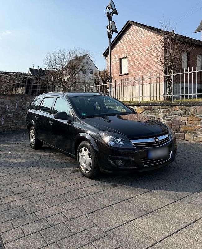 Second-hand Opel Astra 110 CP (80 kW) 2009 Negru Break