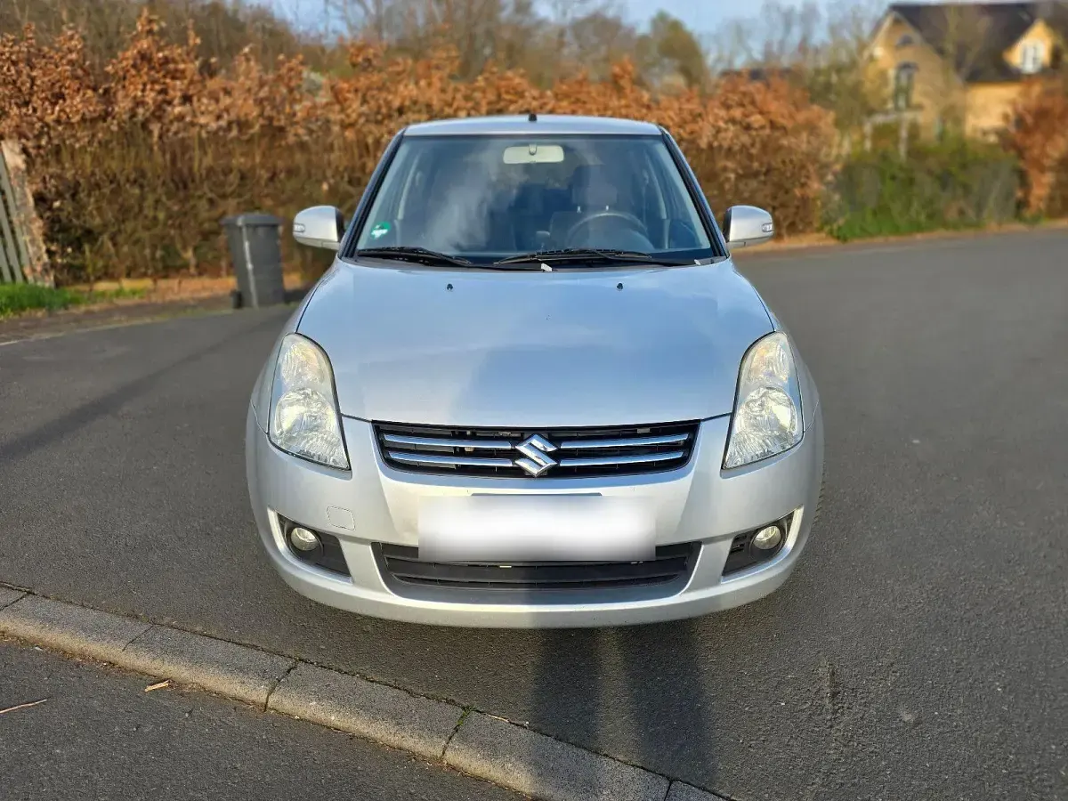 Gebraucht Suzuki Swift 92 PS (67 kW) 2011 Grau Kleinwagen