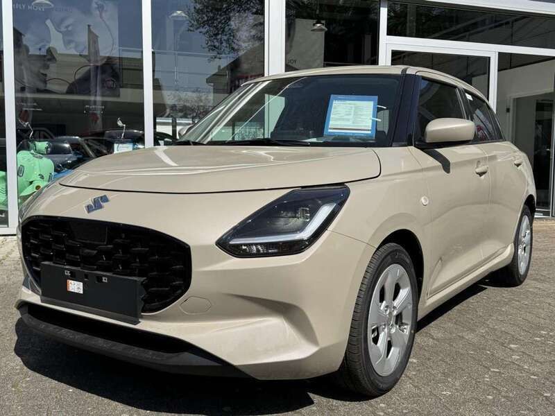Beige (caravan ivory pearl metallic) Neu 2025 Suzuki Swift Comfort Kleinwagen | 19.540 € - Bild 1/4