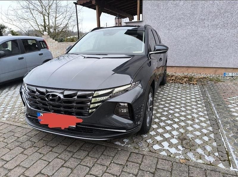 Grau Gebraucht 2022 Hyundai Tucson Trend SUV | 24.850 € (Fairer Preis) - Bild 1/4