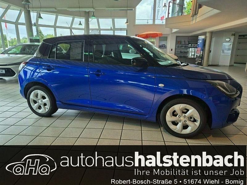 Frontier blue / super black me Neu 2025 Suzuki Swift Comfort Limousine | 18.990 € - Bild 1/4