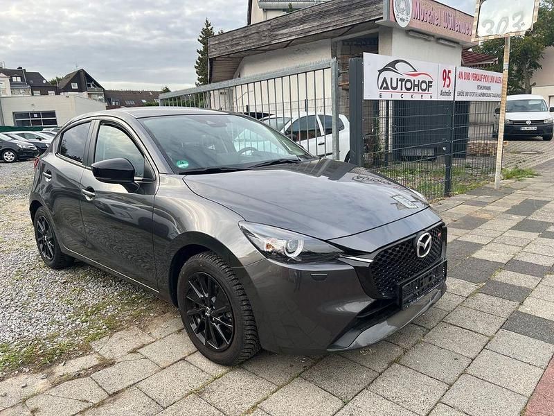 Grau Gebraucht 2024 Mazda 2 Homura-Aka Limousine | 15.999 € (Superpreis) - Bild 1/4