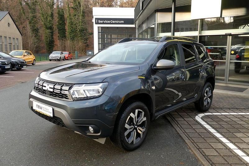 Grau Gebraucht 2023 Dacia Duster Journey SUV | 18.890 € (Fairer Preis) - Bild 1/4