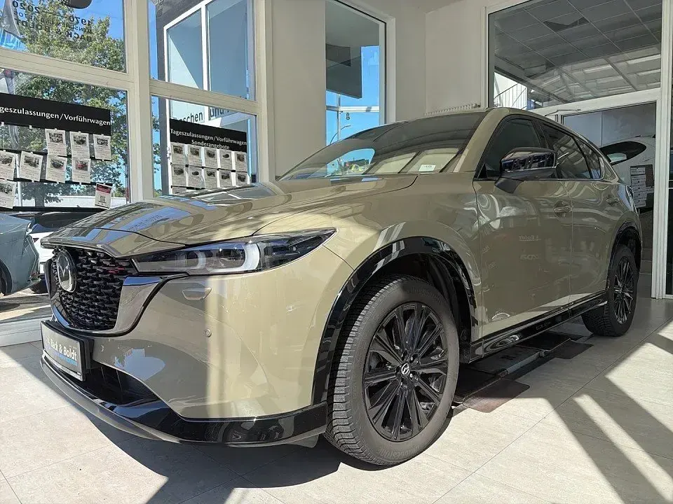 Gebraucht Mazda CX-5 Homura-Line 194 PS (142 kW) 2023 Zircon sand SUV